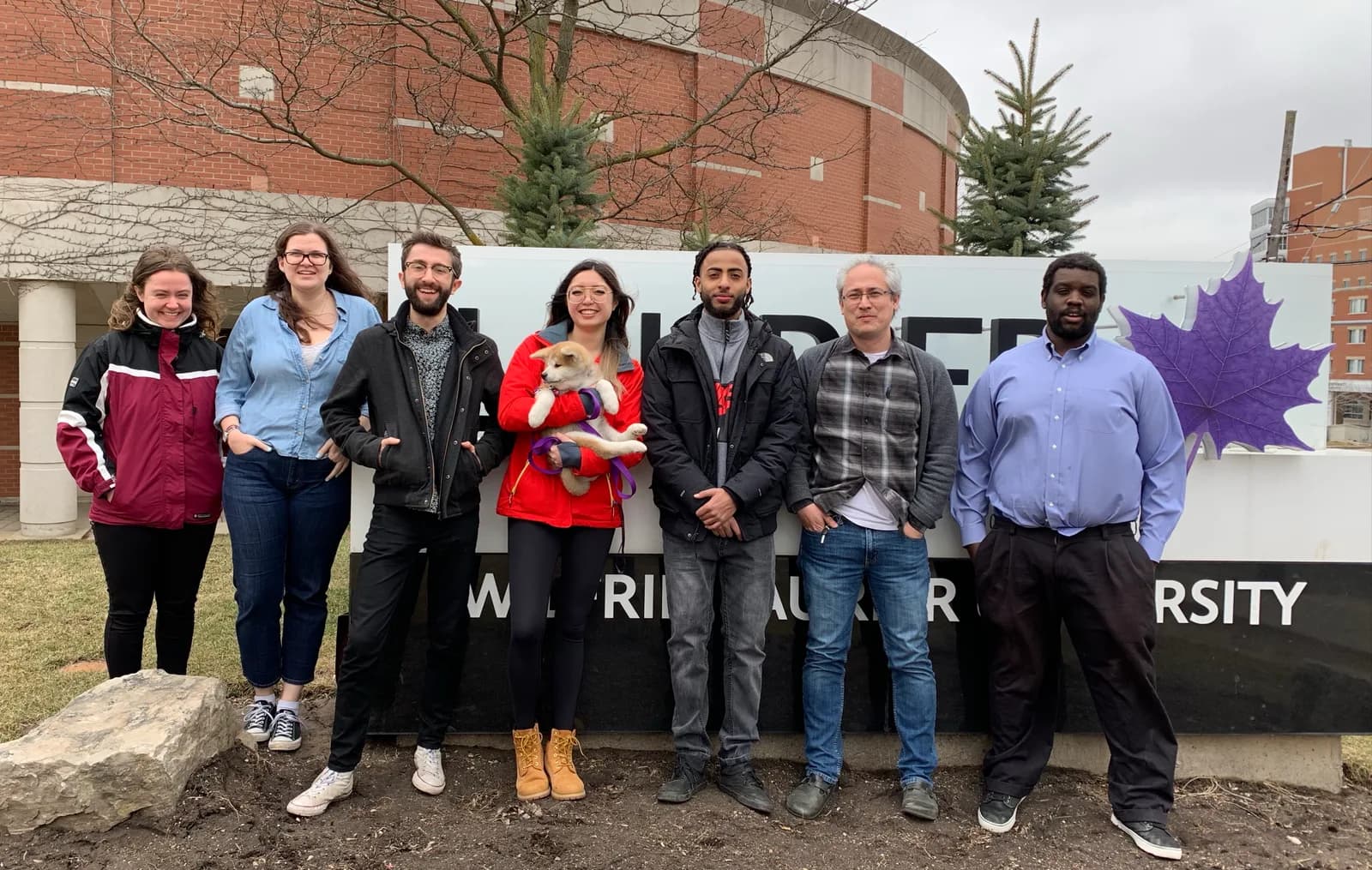 Tamir with his research lab colleagues at Wilfrid Laurier University